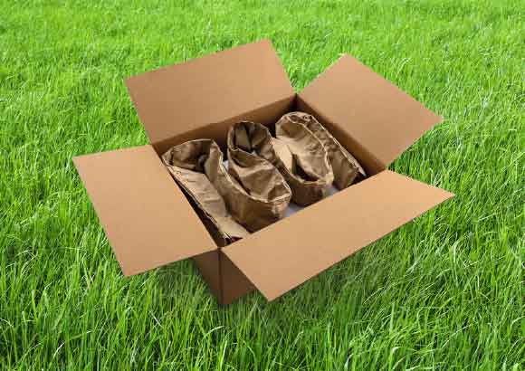 GrasiKraft, packaging on the grass.jpg (GrasiKraft – sustainable void fill)