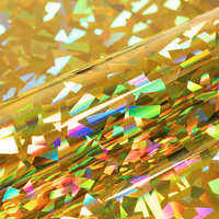 Siser, Holographic, brillant, polyester, H0088 - crystal gold, 105µm, 500mm x 10.00m, hotmelt, Boîte de 1 rouleau, H0088/0.50